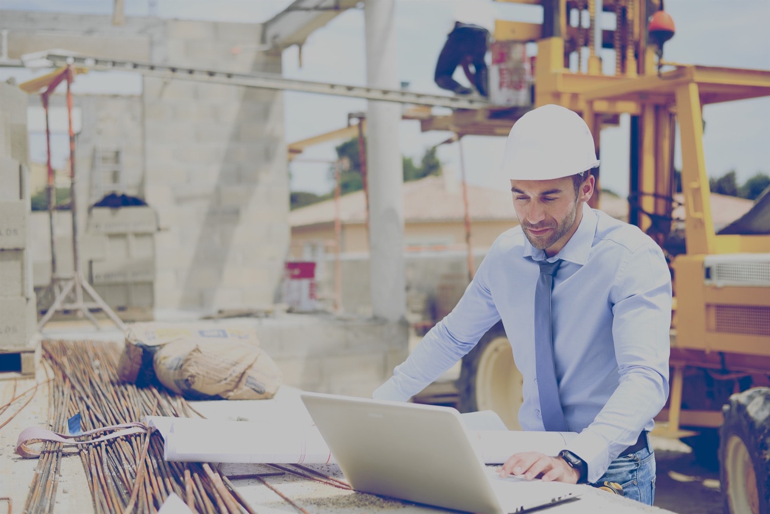 A General Contractor Reviewing Construction Plans