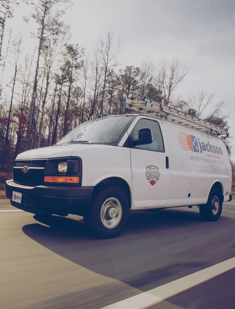 HVAC Service Van That Uses Auto Propane Driving On a Highway.