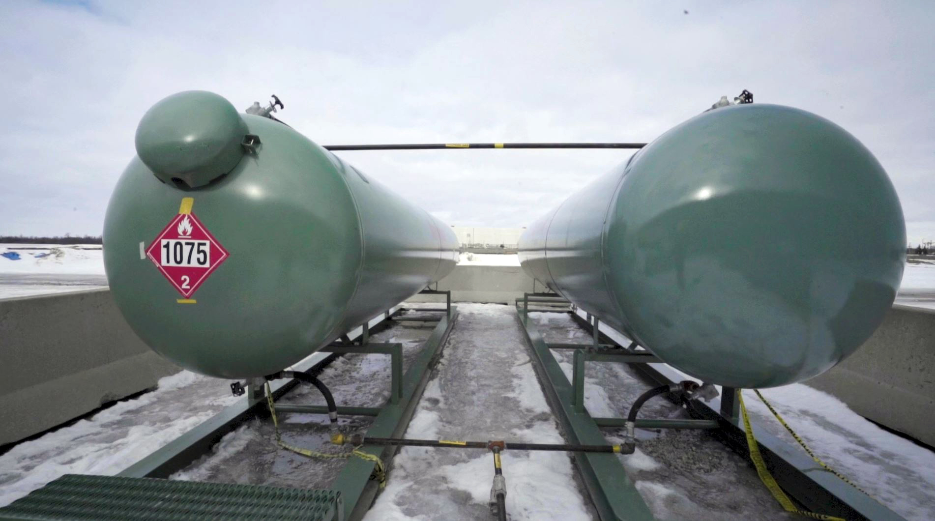 Two green Superior Propane tanks