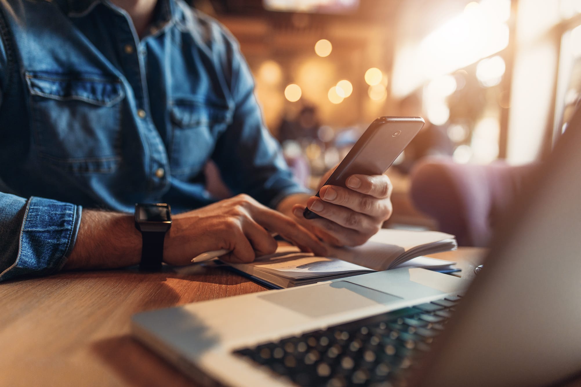 Close up of hands using a mobile phone