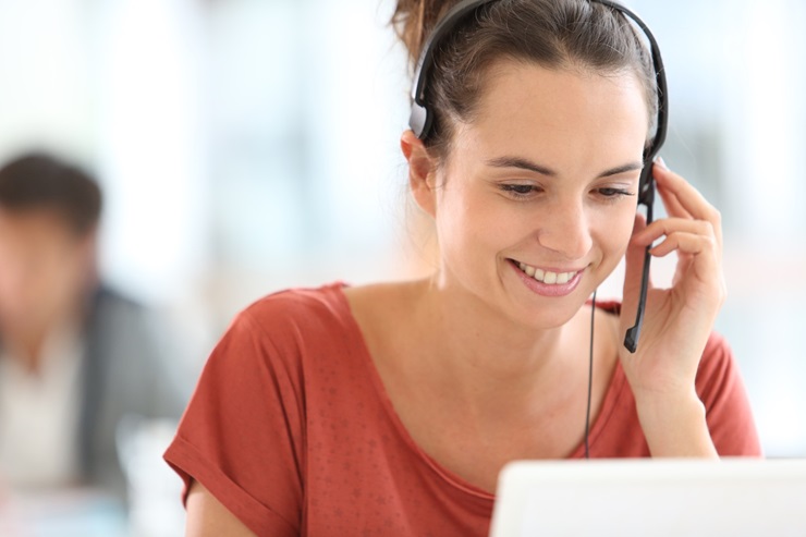 A Superior Propane customer service employee talking on a headset. 