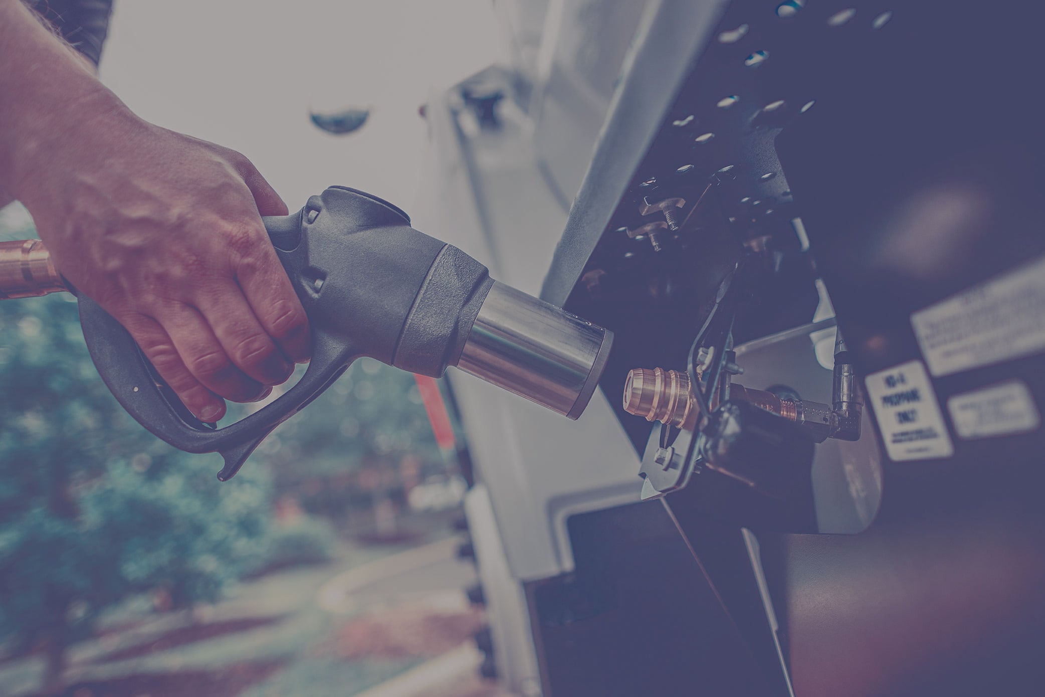 Closeup of the fueling tank on a vehicle with propane autogas. 