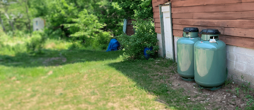 two propane cylinders outside a home