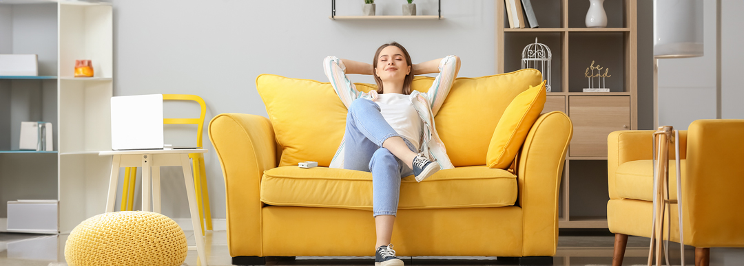 woman enjoys propane furnace heat